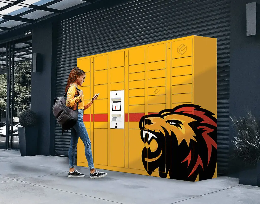 College student standing at quadient parcel pending lockers to retrieve a package