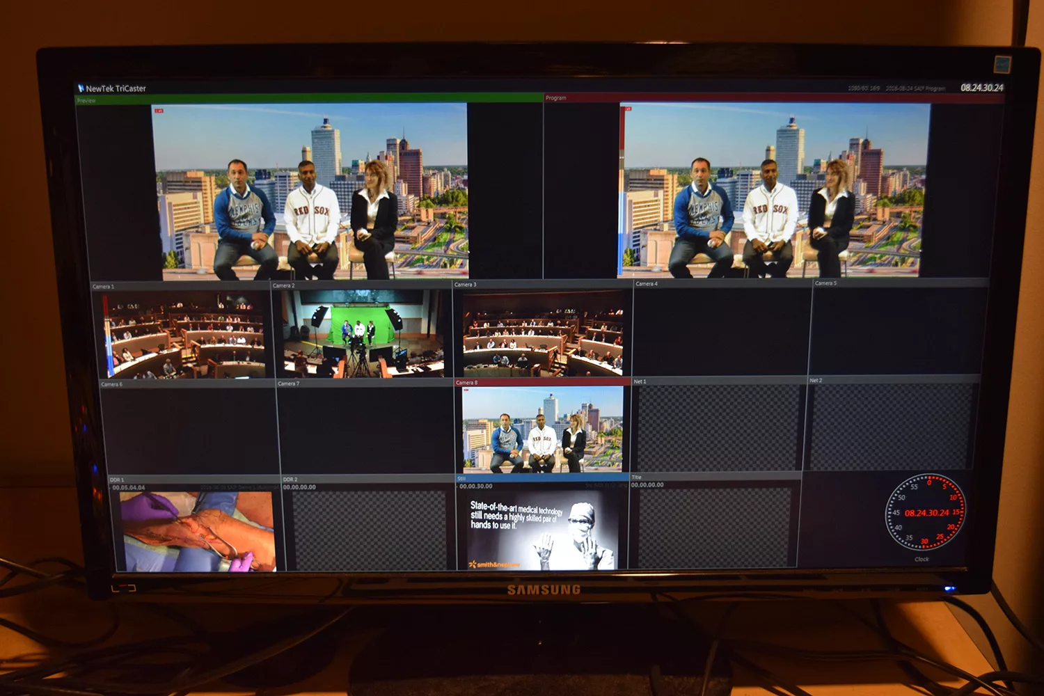 Image of a computer screen displaying the newtek tricaster software in action, demonstrating its capabilities for real-time video production. Various windows within the software are open, showing different aspects of the production process. This image provides a glimpse into the advanced technology used in mcc's corporate video production services, emphasizing their cutting-edge resources.