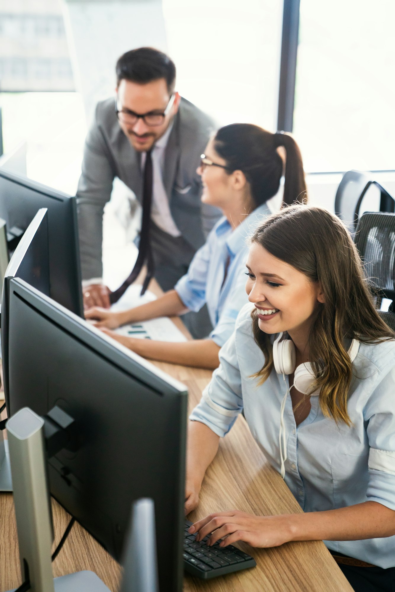 Group of multiethnic business people working at busy modern office