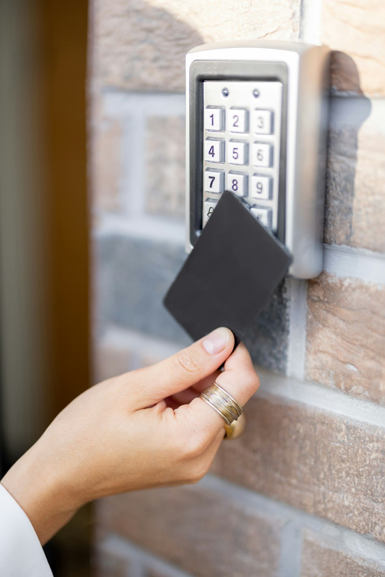 Attaching card to the electronic reader to access the office or apartment