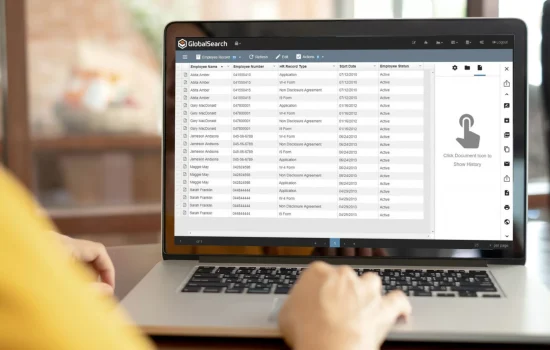 Professional woman confidently navigating the Square 9 document management software (DMS) on her computer. This image exemplifies the ease-of-use and practical benefits of integrating such robust document management systems into your business operations. See firsthand how our workflow automation can streamline tasks and boost efficiency in your daily routines.