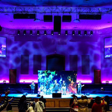 Image of the Breath of Life Church stage featuring audio visual lighting and sound systems by MCC.